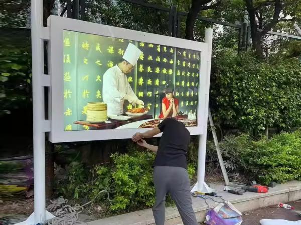 Where do people get the most exposure to outdoor media advertising display machine screen